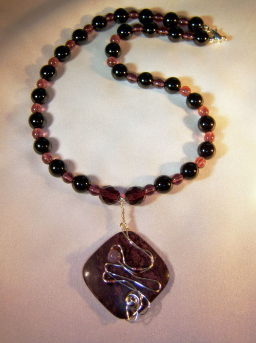 468n - 17 inch handcrafted necklace, wire wrapped purple stone pendant and glass beads