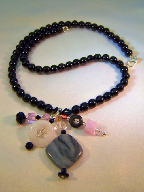 504n - 21 inch handcrafted necklace, pinks and gray multi dangle and black opaque,